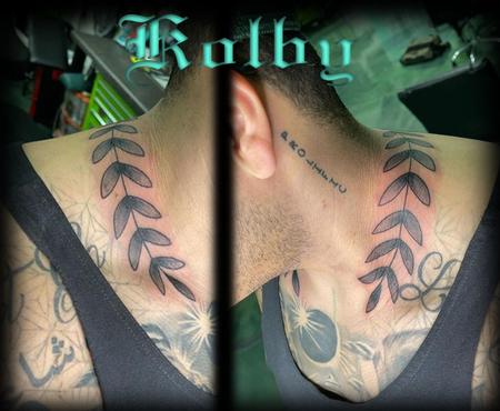 Tattoos - vines around the back of neck  - 143921